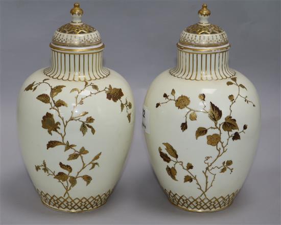 A pair of victorian derby vases and covers height 26cms